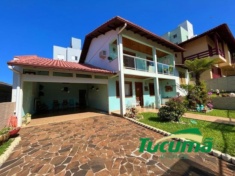 Casa à venda com 3 dormitórios, 2 banheiros, 2 vagas de garagens e 382m² de área privativa no bairro Santa Maria